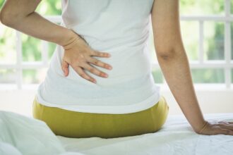 woman kidney disease back pain